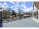 Expansive deck with views of the surrounding trees and blue skies at 1364 Tsali Trl, Morrow, GA 30260