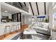 Bright living room with high ceilings, breakfast bar, and view of the second floor loft at 1364 Tsali Trl, Morrow, GA 30260