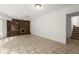 Spacious living room with tiled floor, fireplace, and ample natural light at 1364 Tsali Trl, Morrow, GA 30260