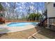 Backyard pool is easily accessible from the second story outdoor stairs at 1364 Tsali Trl, Morrow, GA 30260