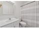 Clean bathroom with a sink, toilet, shower and curtain at 2815 Chandler Grove Dr, Buford, GA 30519