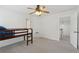 Bedroom featuring soft carpet, a ceiling fan, and a comfortable twin bed at 2815 Chandler Grove Dr, Buford, GA 30519