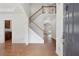 Bright foyer with wood staircase and detailed trim offers a grand entrance at 2815 Chandler Grove Dr, Buford, GA 30519