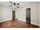 Bedroom with ceiling fan, hardwood flooring and multiple closet spaces at 2873 Sylvan Rd, East Point, GA 30344