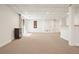 Large, finished basement with bar and walk-out sliding glass door to the yard at 6875 Sunny Brook Ln, Atlanta, GA 30328