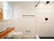 Modern bathroom featuring a walk-in shower with white subway tiles and sleek fixtures at 6875 Sunny Brook Ln, Atlanta, GA 30328