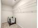 Empty walk-in closet featuring wire shelving and baby play pen at 1947 Thomasville Estate Dr, Atlanta, GA 30315