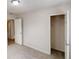 Bedroom with neutral carpet and closet with white wire shelves at 1345 Smoke Hill Dr, Hoschton, GA 30548