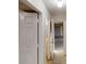 Hallway features multiple doorways, providing access to various rooms and spaces in the house at 1345 Smoke Hill Dr, Hoschton, GA 30548