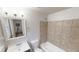 Bathroom features tiled shower, vanity and mirror at 2134 Elinwood Dr, Atlanta, GA 30344