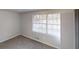 Bright bedroom featuring large windows and neutral carpet at 2134 Elinwood Dr, Atlanta, GA 30344