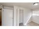 The bedroom has neutral carpet, light walls, and a closet with folding door at 2134 Elinwood Dr, Atlanta, GA 30344