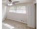 The bedroom has neutral carpet, light walls, and a window with white blinds at 2134 Elinwood Dr, Atlanta, GA 30344