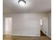 Open living area with wood look flooring and white walls at 2134 Elinwood Dr, Atlanta, GA 30344