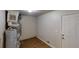 Utility room features wood look floors, water heater, and HVAC system at 2134 Elinwood Dr, Atlanta, GA 30344