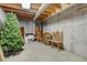 Unfinished basement space showing exposed ceilings, concrete walls, and ample storage potential at 5712 Overlook Cir, Powder Springs, GA 30127