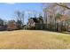 Traditional two-story home with side-entry garage on a well-manicured lawn at 5712 Overlook Cir, Powder Springs, GA 30127