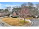 Traditional two-story home with brick accents, a two car garage and a landscaped front yard at 5712 Overlook Cir, Powder Springs, GA 30127