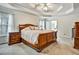 Elegant main bedroom boasts a tray ceiling and plush carpeting at 5712 Overlook Cir, Powder Springs, GA 30127