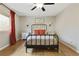 Bedroom with hardwood floors, a ceiling fan, and a window with natural light at 1600 Briarcliff Ne Rd # 5, Atlanta, GA 30306