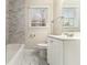 Well-lit bathroom featuring modern fixtures, updated tile and a shower/tub combo at 3169 Bluebird Ln, Decatur, GA 30032