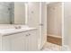 Bathroom featuring modern fixtures, updated tile and a separate storage closet at 3169 Bluebird Ln, Decatur, GA 30032