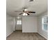 Bedroom featuring a ceiling fan, neutral walls, and natural light at 4481 Buckingham Cir, Decatur, GA 30035