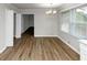 Dining Room with natural light from windows and hardwood floors at 4481 Buckingham Cir, Decatur, GA 30035