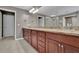 Bathroom with double vanity and granite counters at 104 Edgewater Trl, Canton, GA 30115