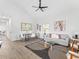 Spacious living room with modern decor, hardwood floors, and plenty of natural light at 937 Camilla Sw St, Atlanta, GA 30314