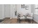 Cozy sitting area featuring modern chairs, decor, and a doorway to an updated bathroom at 937 Camilla Sw St, Atlanta, GA 30314