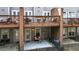 Multi-level porches with outdoor seating create backyard charm and privacy at 1583 Mosaic Way, Smyrna, GA 30080