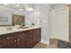 Bathroom features a double sink vanity with granite counters and a separate shower room at 1583 Mosaic Way, Smyrna, GA 30080