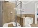 Bathroom includes a tub and walk-in shower with tiled walls and glass enclosure at 1583 Mosaic Way, Smyrna, GA 30080