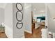 Upstairs hallway leads to an open-concept living area with modern decor and an airy ambiance at 1583 Mosaic Way, Smyrna, GA 30080