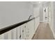 Upstairs hallway features white railings with wood accents at 1583 Mosaic Way, Smyrna, GA 30080
