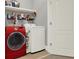 Functional laundry room with modern appliances, storage shelves, and easy access at 1583 Mosaic Way, Smyrna, GA 30080