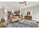 Bright living room featuring neutral walls, modern furnishings, and an open floor plan at 1583 Mosaic Way, Smyrna, GA 30080