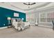 Large primary bedroom featuring trey ceiling, plush carpeting, ample natural light, and stylish decor at 1583 Mosaic Way, Smyrna, GA 30080