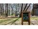 Community park featuring exercise station and a play structure, set amid a beautiful wooded landscape at 1583 Mosaic Way, Smyrna, GA 30080