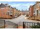 Beautiful view of townhome community with lush landscaping and inviting street appeal at 1583 Mosaic Way, Smyrna, GA 30080