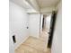 Unfinished basement area with utility hookups, light wood flooring, and convenient access to other rooms at 2371 Cresta Dr, Decatur, GA 30032