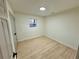 Neutral bedroom with hardwood floors and window at 2371 Cresta Dr, Decatur, GA 30032