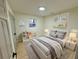 Cozy bedroom with a comfortable bed, stylish decor, and ample natural light from the window at 2371 Cresta Dr, Decatur, GA 30032