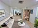 Cozy living room boasts a comfortable sofa, stylish rug, and charming bookshelf, all bathed in natural light at 2371 Cresta Dr, Decatur, GA 30032