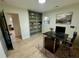 Bright office with built-in shelving, desk, and ample natural light at 2371 Cresta Dr, Decatur, GA 30032