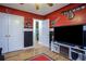 Bedroom with Atlanta Falcons theme, hardwood floors, ceiling fan, and good natural light at 281 Laney Dr, Locust Grove, GA 30248