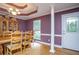 Elegant dining room with hardwood floors, a hutch and natural light at 281 Laney Dr, Locust Grove, GA 30248