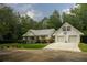 Lovely single-story home with an attached two-car garage and a basketball hoop at 281 Laney Dr, Locust Grove, GA 30248