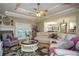 Open concept living room with fireplace, coffered ceiling and access to the kitchen at 281 Laney Dr, Locust Grove, GA 30248